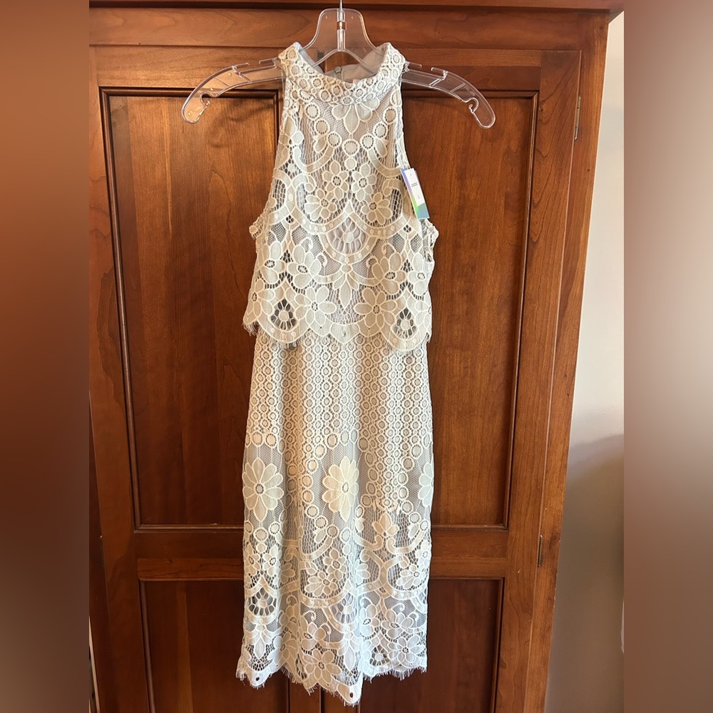 NWT Misguided halter lace dress in ivory w/grey lining size 4. Knee length.
